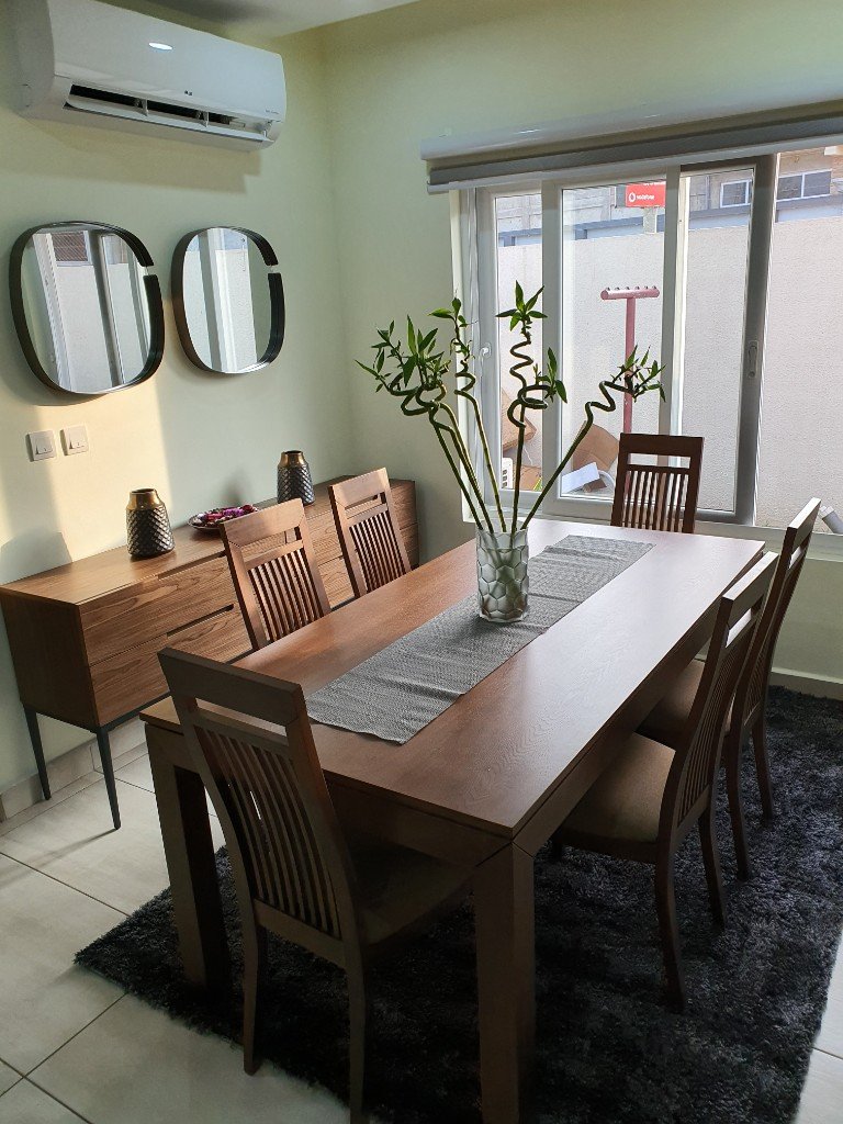 Modern dining area with pendant lighting