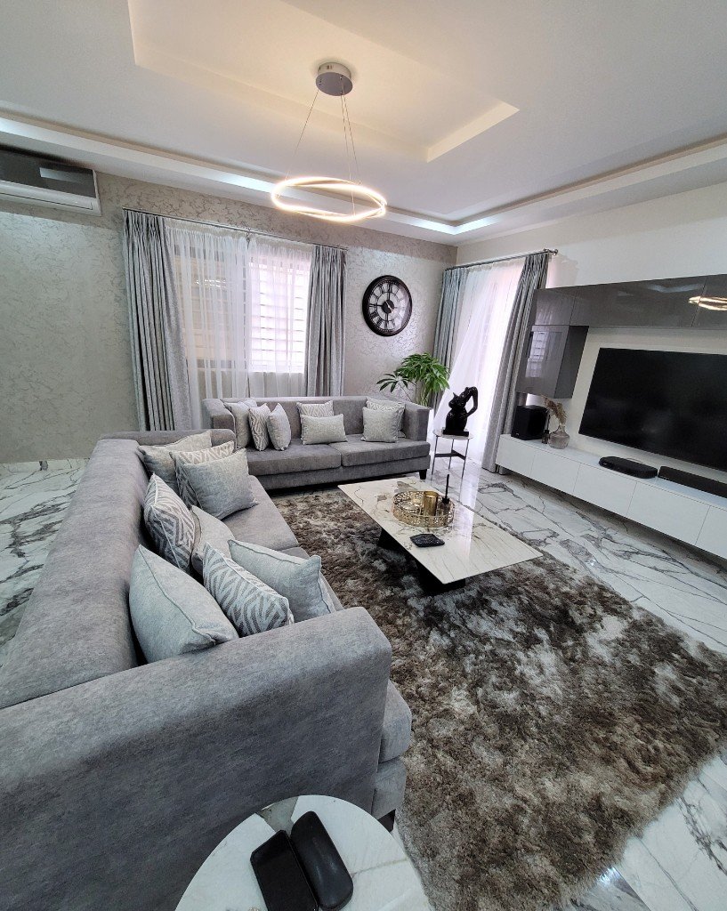 Grey living room completed by D'anges Interiors